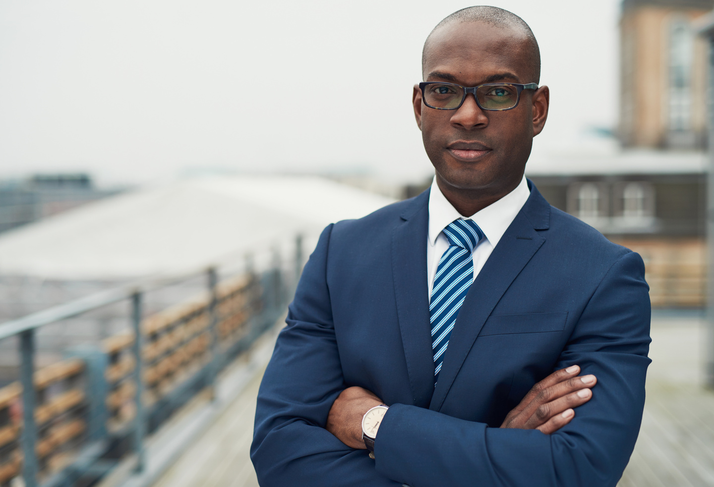 Portrait of a Businessman Crossing Arms Outdoors